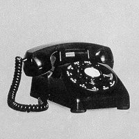 black rotary dial telephone